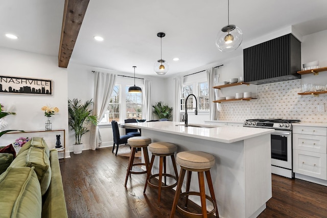 1211 Stratford Ave, Nashville, TN 37216 - kitchen with stainless steel range with gas stovetop, a sink, open shelves, wall chimney range hood, and light countertops