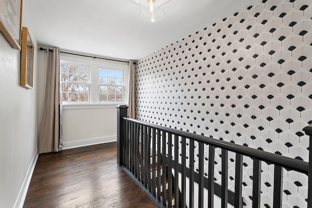 1211 Stratford Ave, Nashville, TN 37216 - corridor featuring baseboards, dark wood-style floors, and an upstairs landing