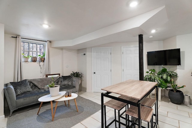 1211 Stratford Ave, Nashville, TN 37216 - living room featuring light tile patterned floors, recessed lighting, and baseboards