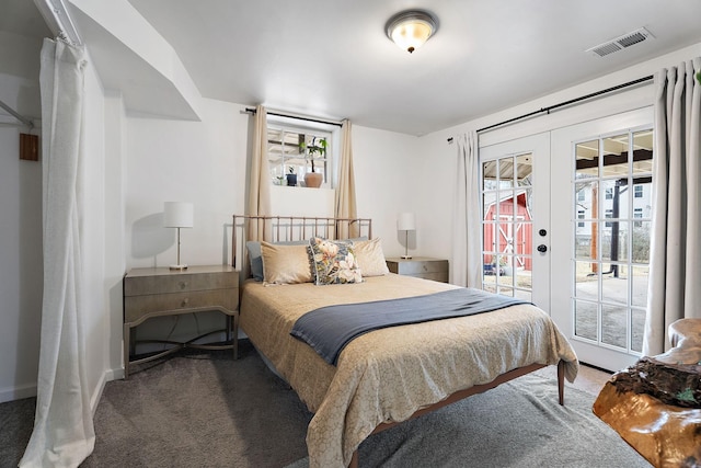 1211 Stratford Ave, Nashville, TN 37216 - carpeted bedroom featuring french doors, access to exterior, and baseboards