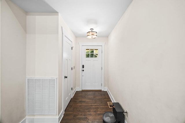 100 Station Dr, Waverly, TN 37185 - doorway to outside with dark wood finished floors and baseboards