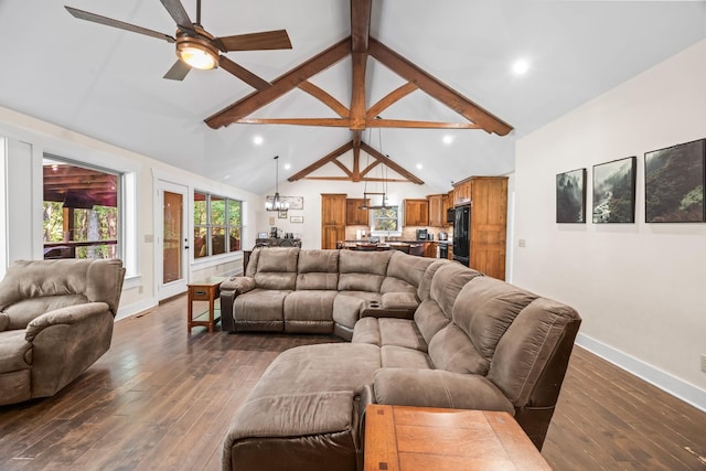 100 Station Dr, Waverly, TN 37185 - living room featuring a chandelier, dark wood finished floors, beam ceiling, baseboards, and a ceiling fan