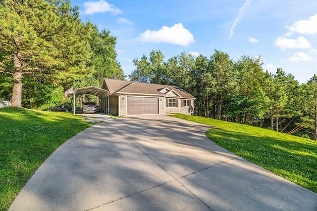 100 Station Dr, Waverly, TN 37185 - single story home with a front yard, concrete driveway, an attached garage, and a detached carport