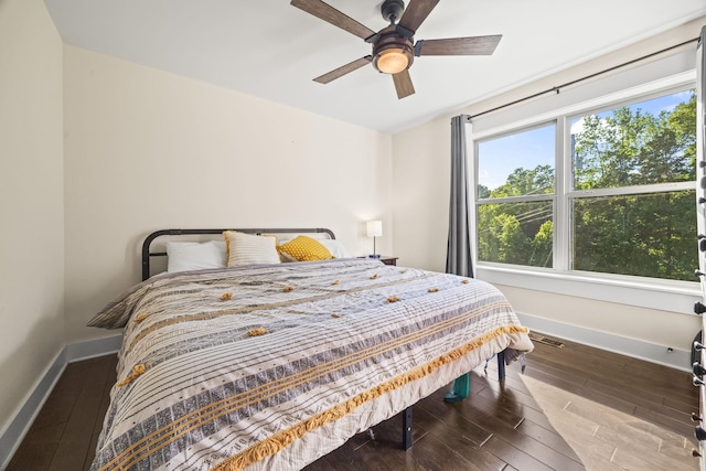 100 Station Dr, Waverly, TN 37185 - bedroom featuring baseboards, hardwood / wood-style floors, and a ceiling fan