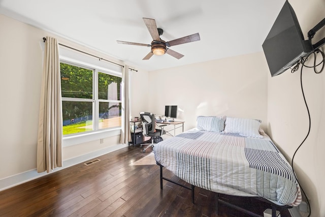 100 Station Dr, Waverly, TN 37185 - bedroom with hardwood / wood-style floors, baseboards, a desk, and a ceiling fan