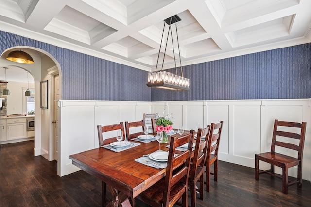 2809 Vaulx Ln, Nashville, TN 37204 - dining room featuring wallpapered walls, dark wood-type flooring, coffered ceiling, arched walkways, and a decorative wall