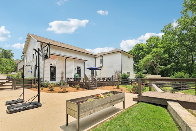 2809 Vaulx Ln, Nashville, TN 37204 - view of home's community with a wooden deck and a patio area