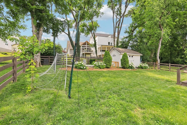 2809 Vaulx Ln, Nashville, TN 37204 - fenced backyard featuring an outdoor structure