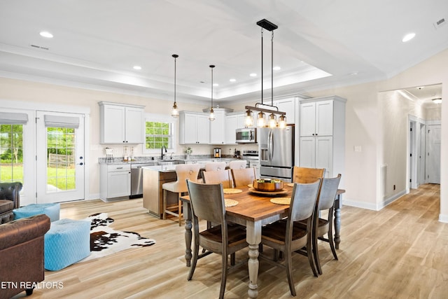 837 Majestic Mountains Blvd, Walland, TN 37886 - dining room featuring a tray ceiling, crown molding, light wood finished floors, recessed lighting, and baseboards