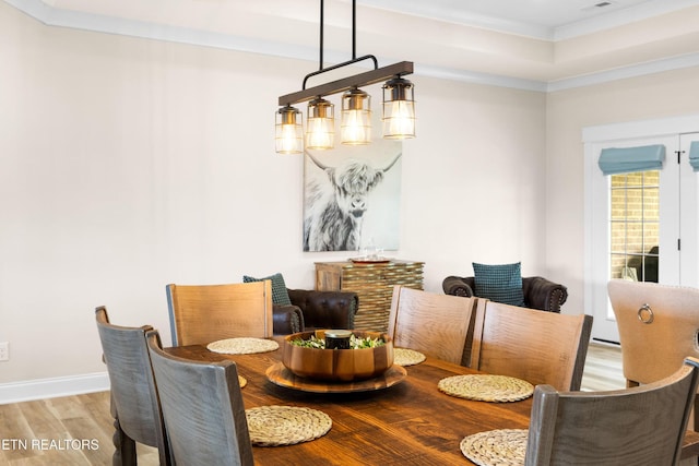 837 Majestic Mountains Blvd, Walland, TN 37886 - dining room with wood finished floors, ornamental molding, and baseboards