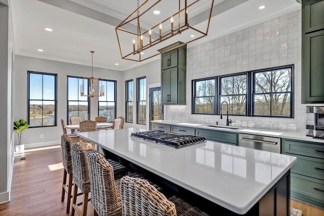337 Lake Court Dr, Lynchburg, TN 37352 - kitchen featuring green cabinetry, stainless steel appliances, a chandelier, light countertops, and recessed lighting