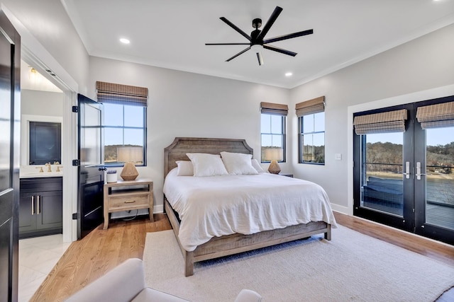 337 Lake Court Dr, Lynchburg, TN 37352 - bedroom featuring access to exterior, french doors, recessed lighting, light wood finished floors, and a sink
