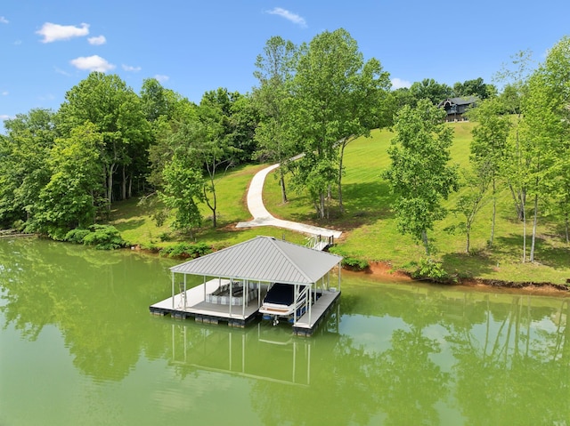 337 Lake Court Dr, Lynchburg, TN 37352 - dock featuring boat lift, a water view, and view of scattered trees