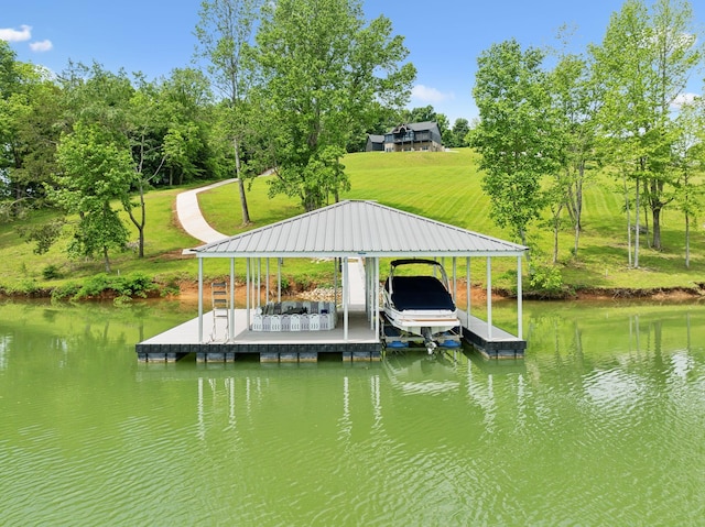 337 Lake Court Dr, Lynchburg, TN 37352 - dock featuring boat lift, a water view, and a lawn