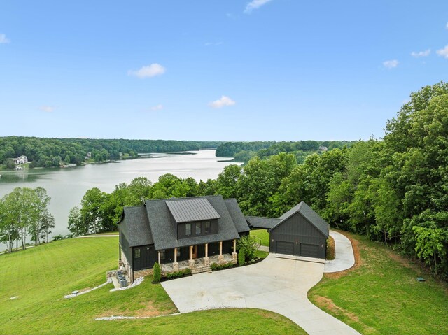 337 Lake Court Dr, Lynchburg, TN 37352 - bird's eye view of a nearby body of water and a heavily wooded area