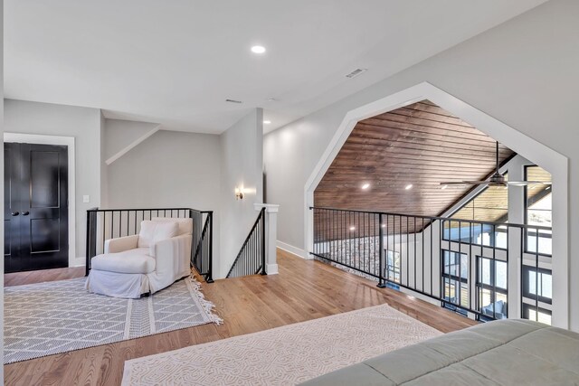 337 Lake Court Dr, Lynchburg, TN 37352 - sitting room with an upstairs landing, wood finished floors, baseboards, a ceiling fan, and recessed lighting