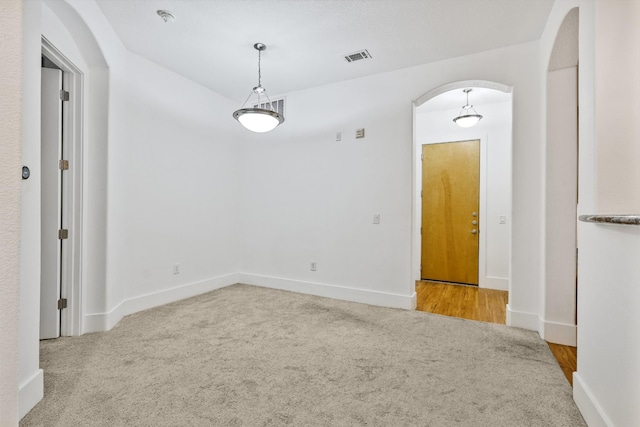 2600 Hillsboro Pike # 233, Nashville, TN 37212 - carpeted empty room with arched walkways, baseboards, and a smoke detector