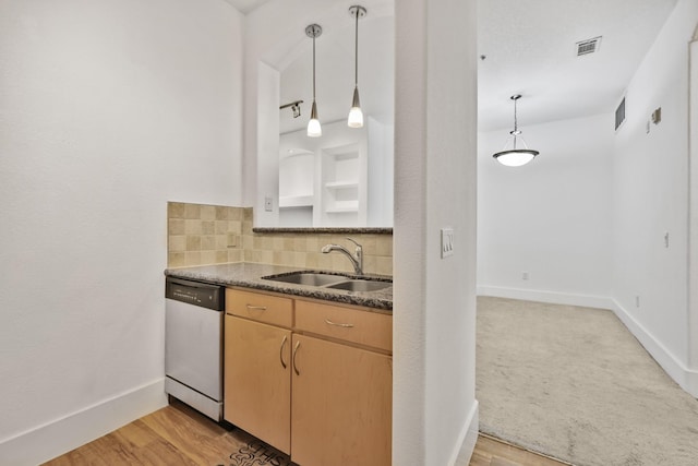 2600 Hillsboro Pike # 233, Nashville, TN 37212 - kitchen featuring dishwasher, a sink, tasteful backsplash, baseboards, and light wood-style flooring