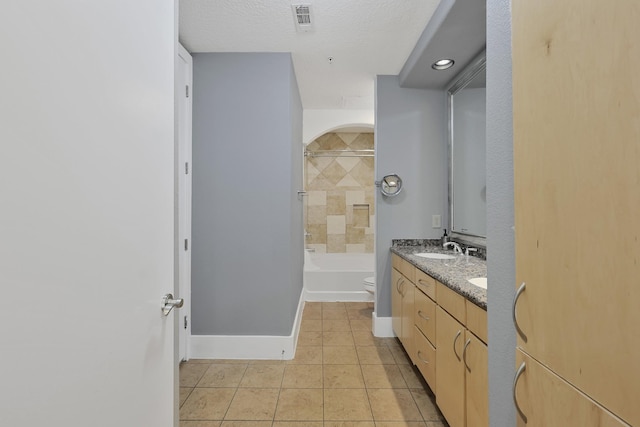 2600 Hillsboro Pike # 233, Nashville, TN 37212 - bathroom featuring toilet, tile patterned floors, double vanity,  shower combination, and baseboards