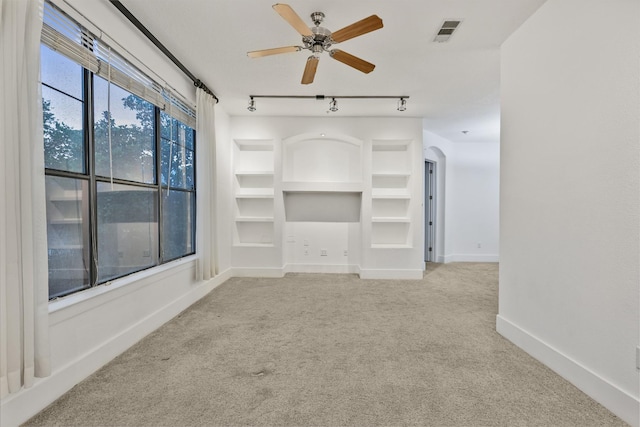 2600 Hillsboro Pike # 233, Nashville, TN 37212 - spare room with carpet floors, track lighting, a ceiling fan, baseboards, and built in shelves