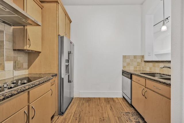 2600 Hillsboro Pike # 233, Nashville, TN 37212 - kitchen with under cabinet range hood, appliances with stainless steel finishes, decorative backsplash, light wood-type flooring, and a sink