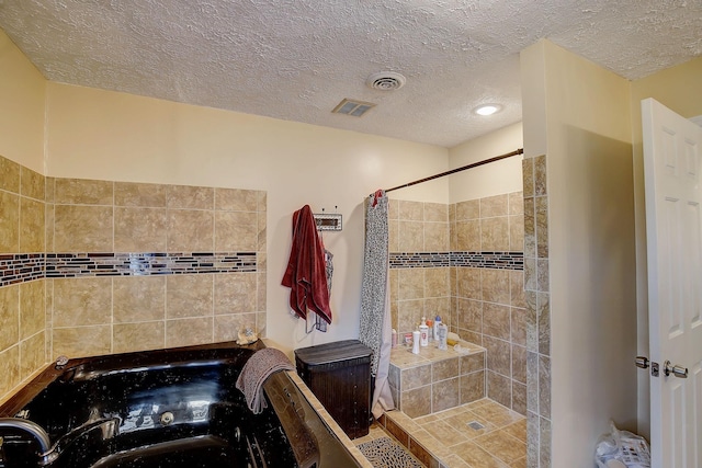 1611 Saltlick Pl, Murfreesboro, TN 37129 - full bathroom featuring a textured ceiling, tiled shower, and a garden tub