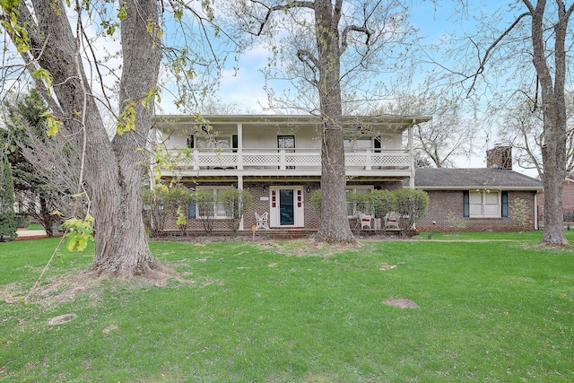 1611 Saltlick Pl, Murfreesboro, TN 37129 - back of property with a yard, a chimney, and brick siding