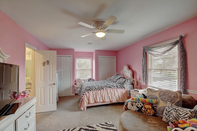 1611 Saltlick Pl, Murfreesboro, TN 37129 - bedroom with light colored carpet, two closets, and a ceiling fan