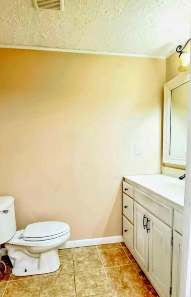 1611 Saltlick Pl, Murfreesboro, TN 37129 - bathroom featuring toilet, vanity, baseboards, a textured ceiling, and tile patterned floors