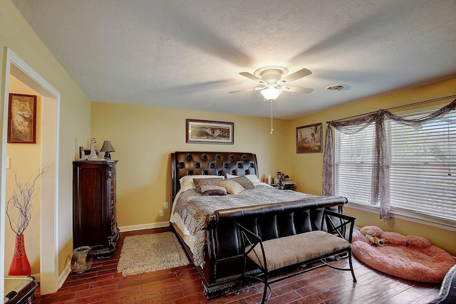 1611 Saltlick Pl, Murfreesboro, TN 37129 - bedroom featuring dark wood-style flooring, baseboards, ceiling fan, and a textured ceiling