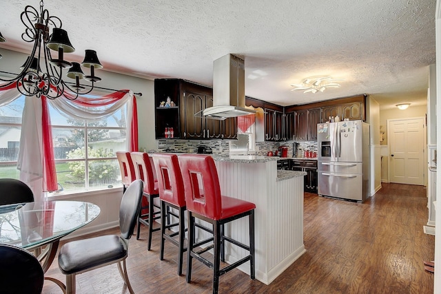 1611 Saltlick Pl, Murfreesboro, TN 37129 - kitchen featuring stainless steel fridge with ice dispenser, a chandelier, island range hood, a textured ceiling, and a peninsula