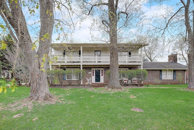 1611 Saltlick Pl, Murfreesboro, TN 37129 - rear view of property featuring a balcony, a yard, and brick siding