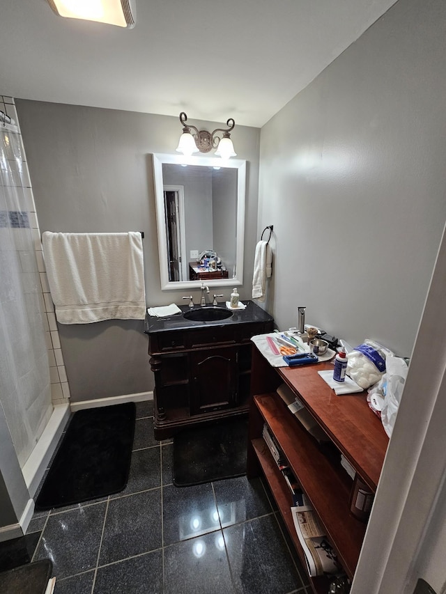 1611 Saltlick Pl, Murfreesboro, TN 37129 - bathroom with vanity, tiled shower, baseboards, and granite tiled floors