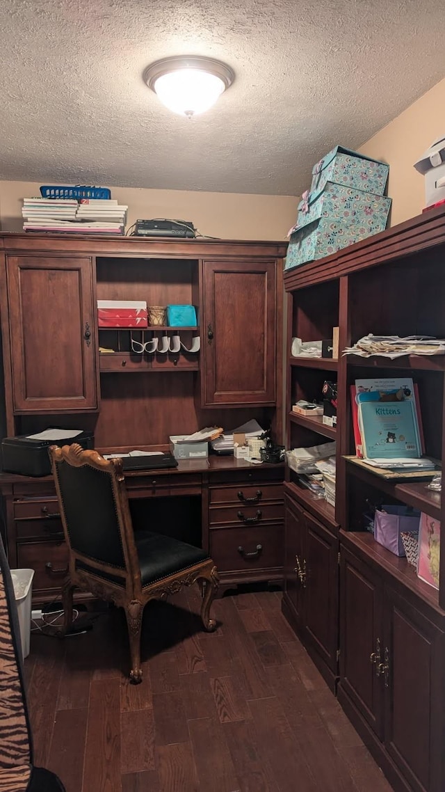 1611 Saltlick Pl, Murfreesboro, TN 37129 - home office with a textured ceiling, dark wood-style floors, and built in desk
