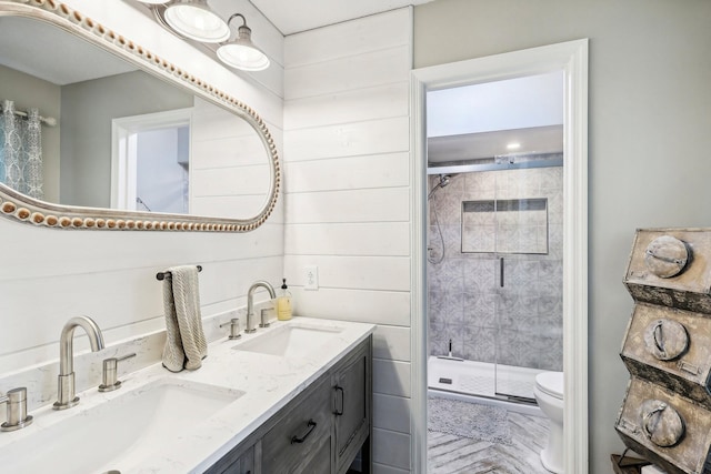 3411 Murphy Ln, Columbia, TN 38401 - bathroom featuring toilet, a stall shower, and double vanity