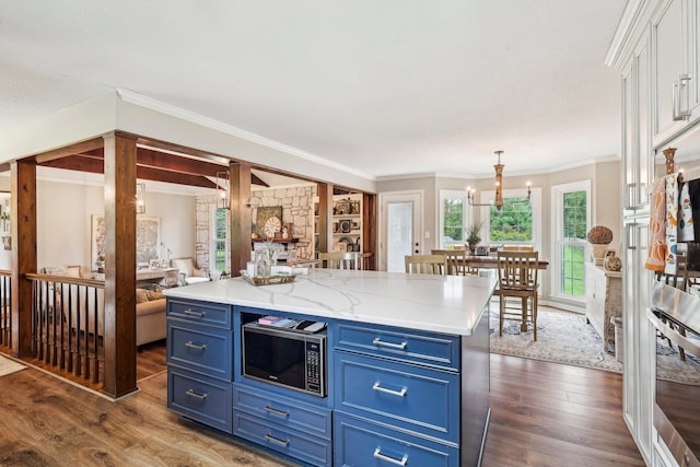 3411 Murphy Ln, Columbia, TN 38401 - kitchen with blue cabinetry, stainless steel appliances, dark wood-style floors, and crown molding