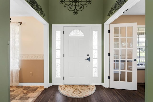 1243 Curtis Dr, Lebanon, TN 37087 - foyer entrance with dark wood-style floors, plenty of natural light, baseboards, and a towering ceiling