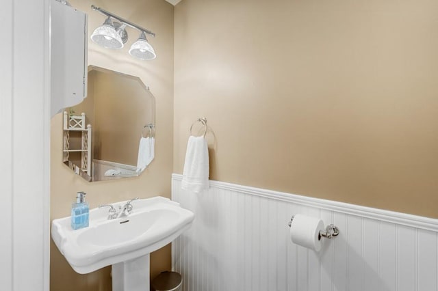 1243 Curtis Dr, Lebanon, TN 37087 - bathroom featuring a wainscoted wall and a sink