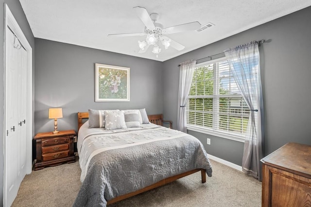 1243 Curtis Dr, Lebanon, TN 37087 - bedroom featuring light carpet, baseboards, a closet, and ceiling fan