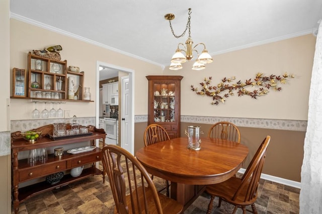 1243 Curtis Dr, Lebanon, TN 37087 - dining room with stone finish floors, ornamental molding, and a chandelier