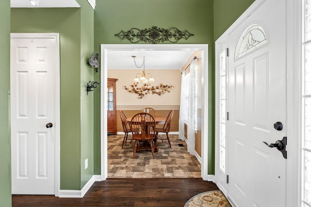 1243 Curtis Dr, Lebanon, TN 37087 - entrance foyer with dark wood-style flooring, baseboards, and a chandelier