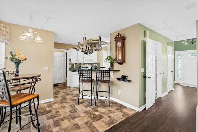 1243 Curtis Dr, Lebanon, TN 37087 - dining area featuring baseboards and a chandelier