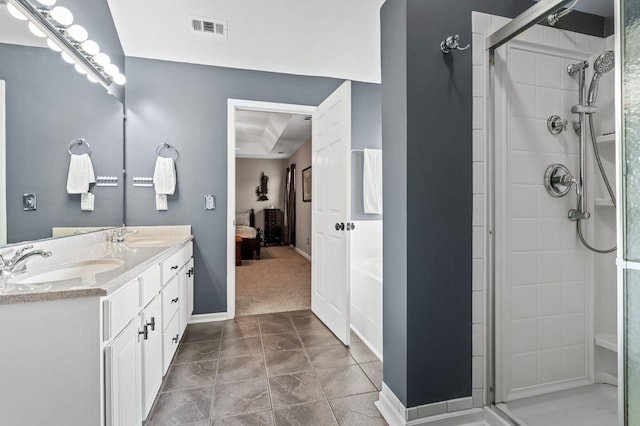 1243 Curtis Dr, Lebanon, TN 37087 - bathroom featuring double vanity, a shower stall, ensuite bath, baseboards, and a bath