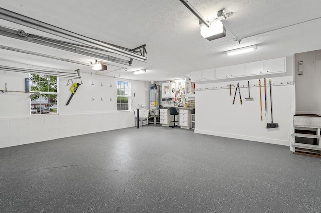 1243 Curtis Dr, Lebanon, TN 37087 - garage featuring water heater and a garage door opener
