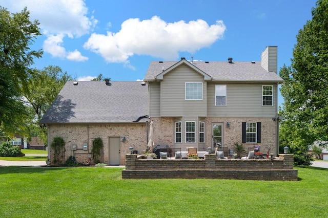 1243 Curtis Dr, Lebanon, TN 37087 - rear view of property with brick siding, a lawn, a chimney, and a patio