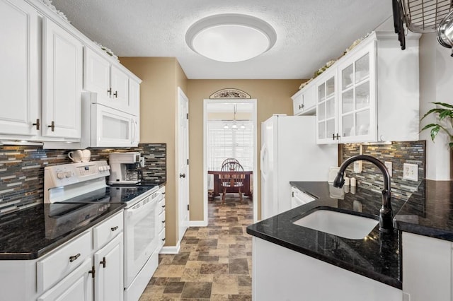 1243 Curtis Dr, Lebanon, TN 37087 - kitchen featuring white appliances, a sink, white cabinets, tasteful backsplash, and a textured ceiling