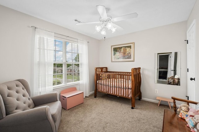 1243 Curtis Dr, Lebanon, TN 37087 - bedroom with light colored carpet, baseboards, a nursery area, and a ceiling fan