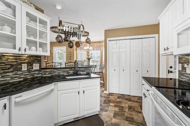 1243 Curtis Dr, Lebanon, TN 37087 - kitchen with white appliances, a sink, backsplash, and white cabinetry
