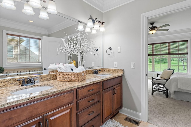 1005 Brittain Downs Dr, Nolensville, TN 37135 - ensuite bathroom featuring double vanity, plenty of natural light, baseboards, crown molding, and a chandelier
