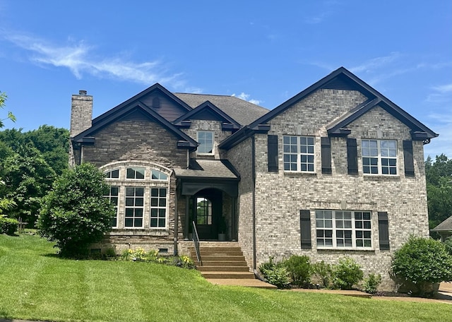 1005 Brittain Downs Dr, Nolensville, TN 37135 - view of front of house featuring a chimney and a front lawn
